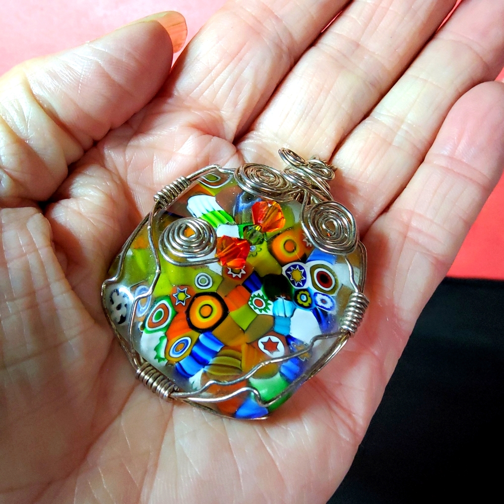 Silverwraped Brooch with Intricate Millefiori Design.